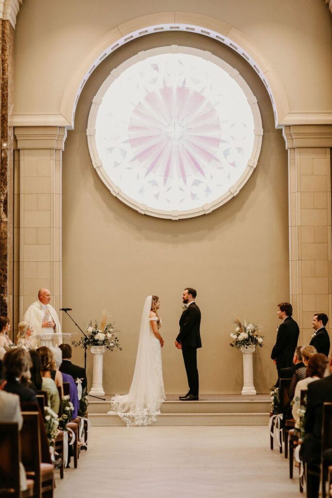 Bride and groom wedding ceremony in Belmont Chapel in Nashville, Tennessee