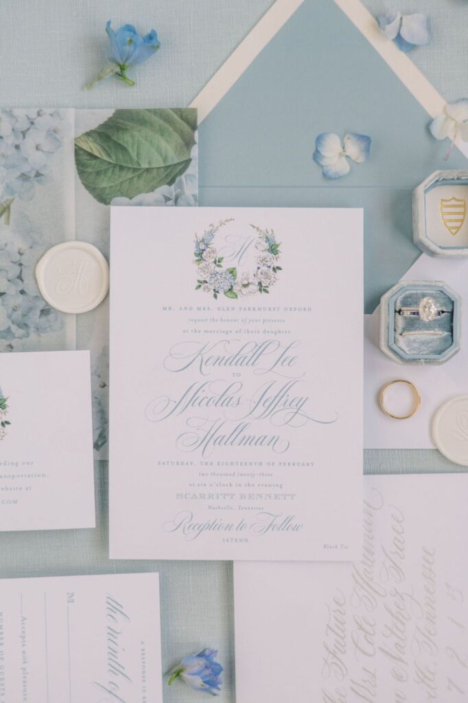 A wedding invite and table setting