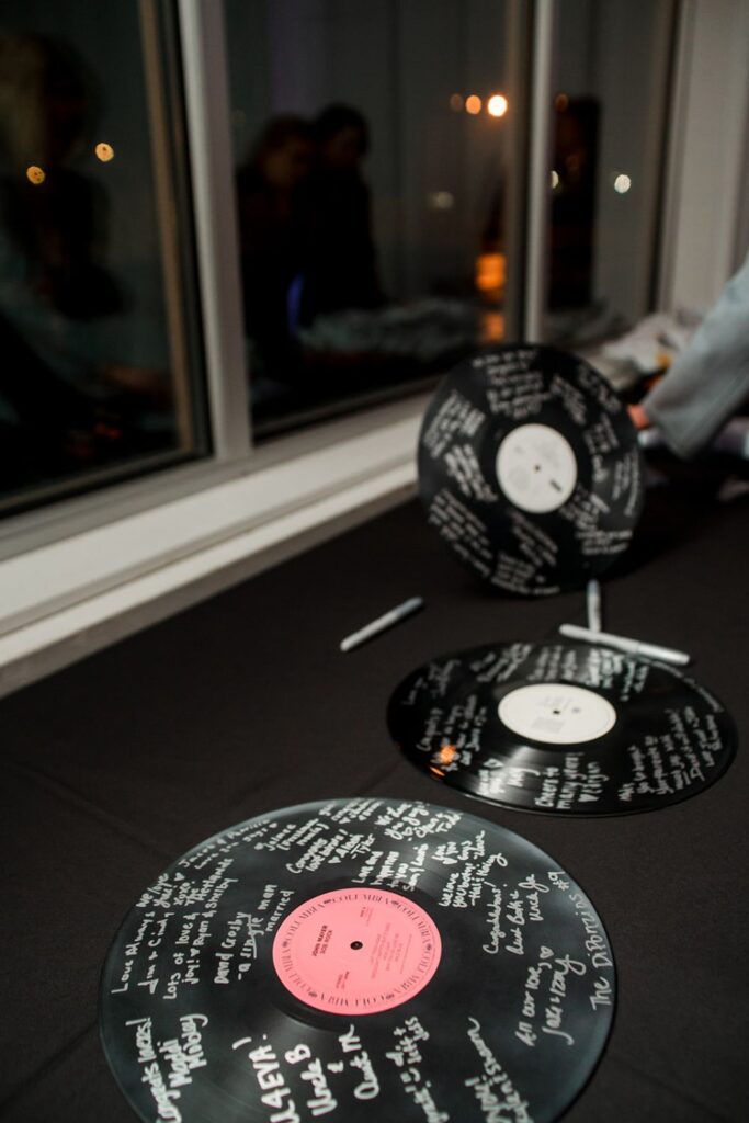Guests signed vinyl records at a wedding at 14TENN in Nashville