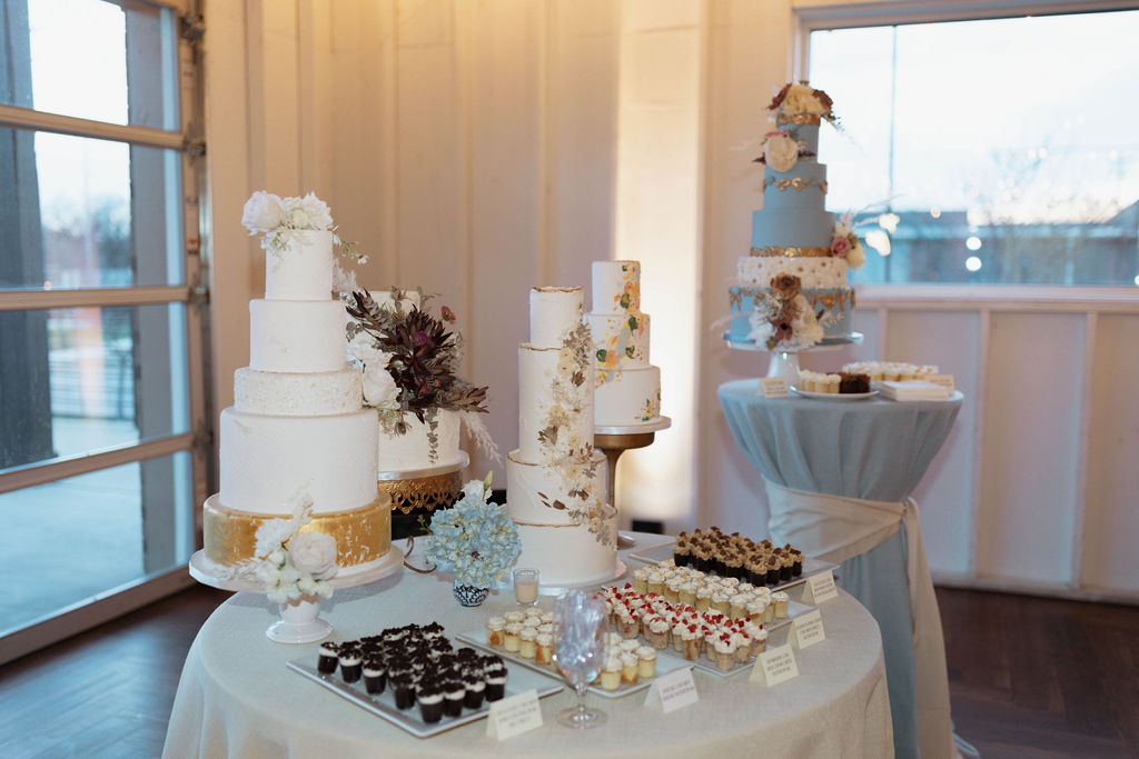 A collection of unique wedding cakes at a Nashville wedding venue
