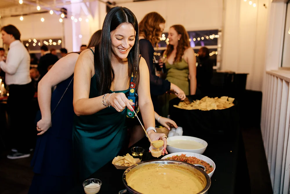 Guest at wedding serving herself from buffet