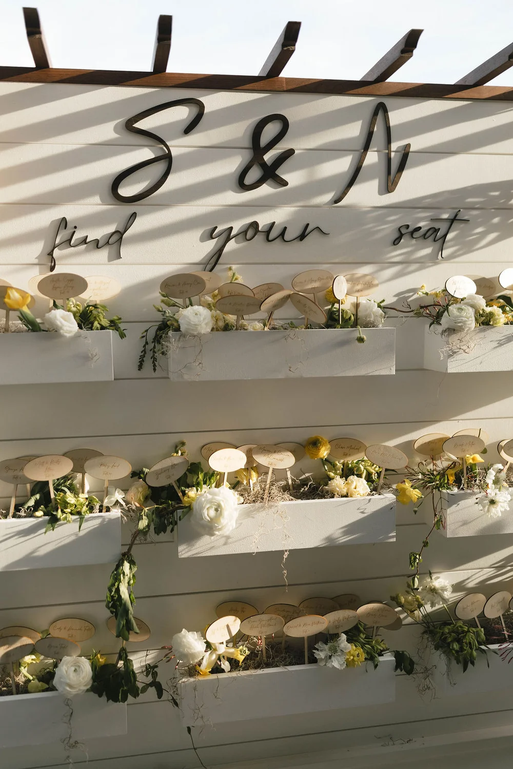 Escort card display at a wedding at 14TENN in Nashville, TN