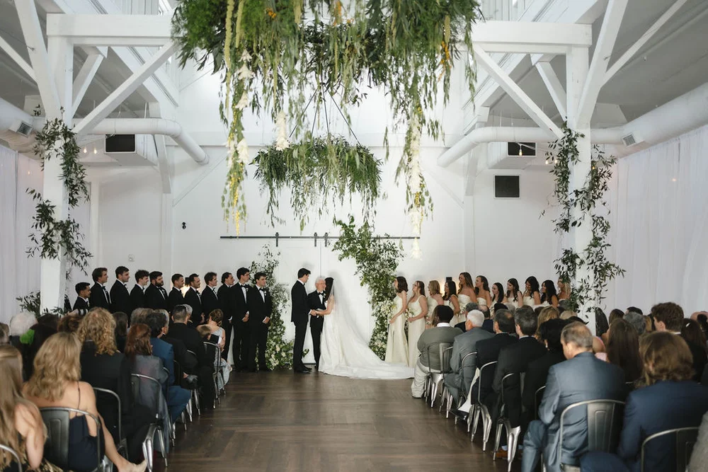 Bride and groom saying their vows during their wedding ceremony at 14TENN in Nashville