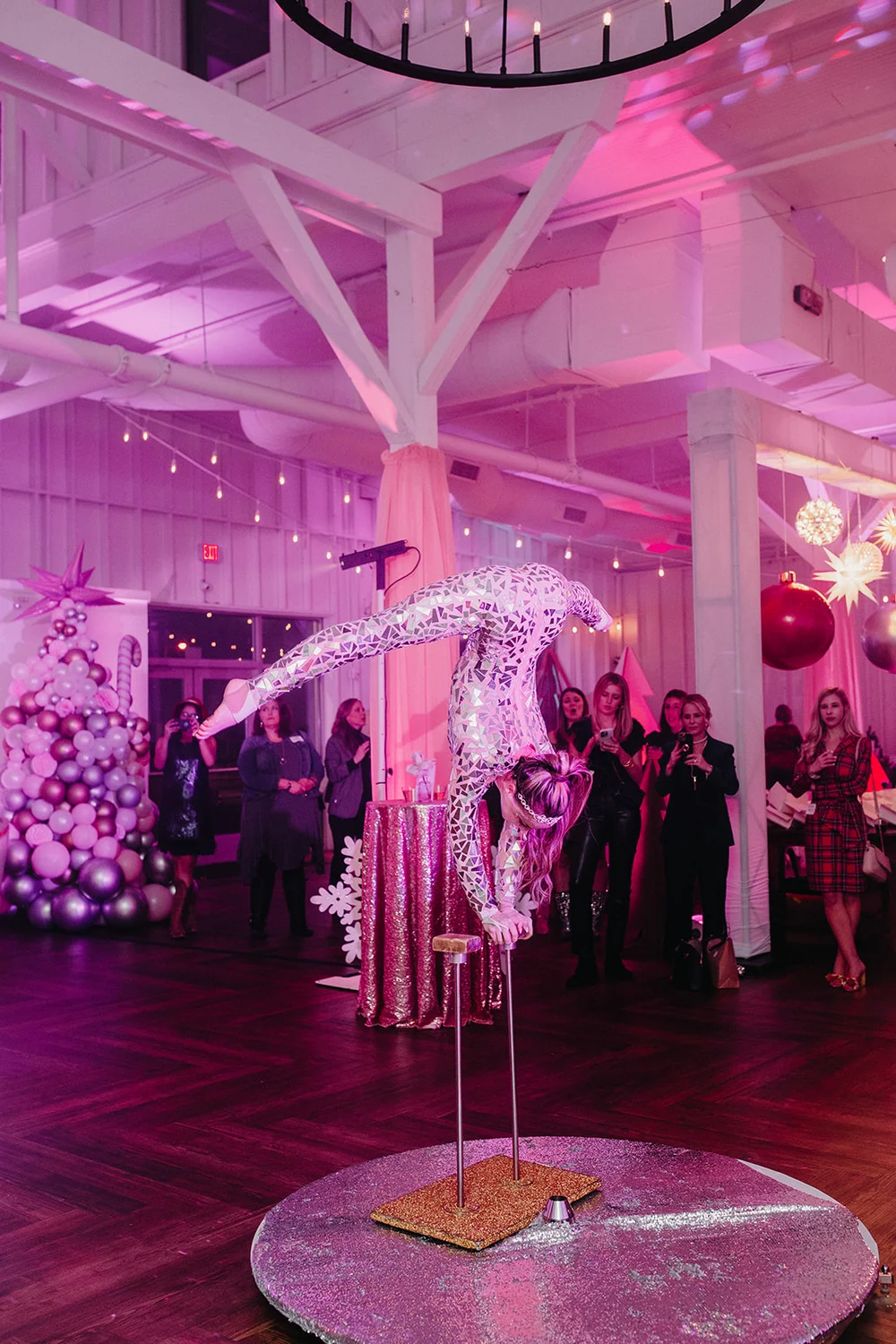 Acrobat performing for a Nashville office holiday party.
