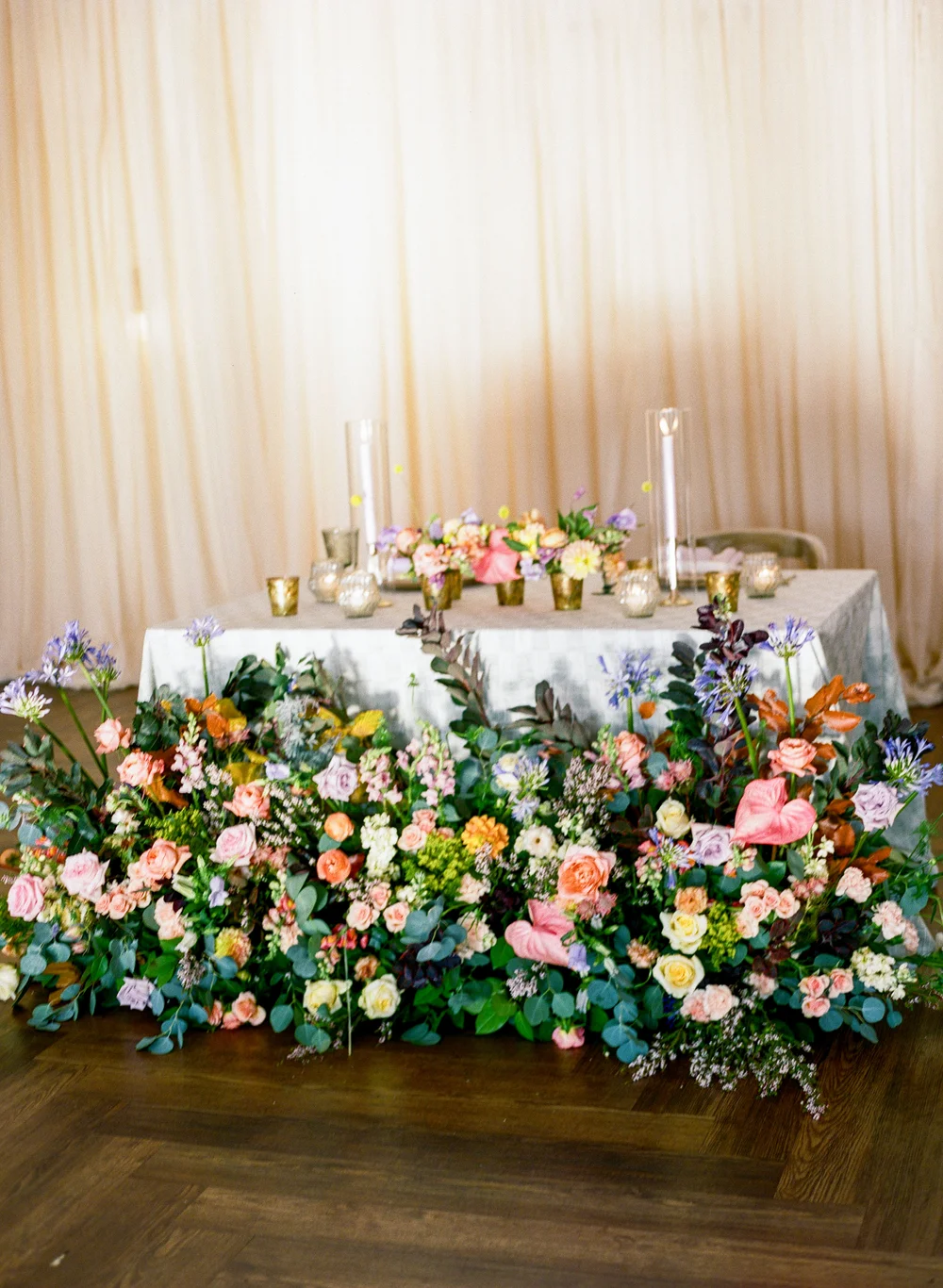 Sweetheart table with massive floral installation at a 14TENN Nashville wedding
